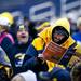A Michigan fan looks at a program during the spring football game on Saturday, April 13. AnnArbor.com I Daniel Brenner